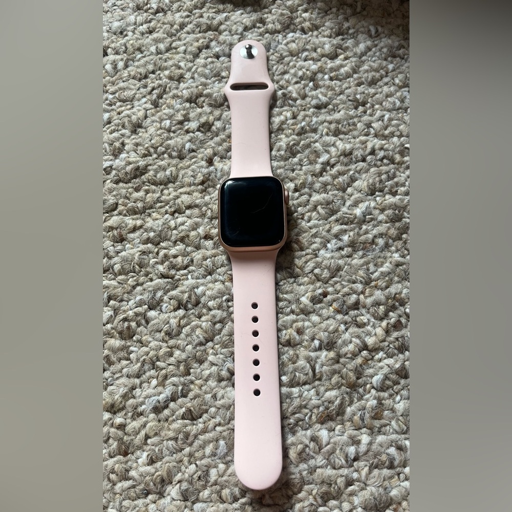 Apple Watch. Series 6. Gold aluminum case; pink sand sports band. Never used!